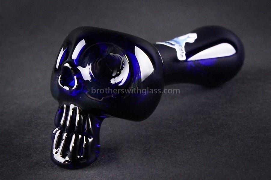 BWG-357B-2_1024x_7c7d95f2-1317-4be6-9e41-ddca3dad954f.jpg Chameleon Glass Bone Head Skull Hand Pipe - Cobalt Blue - Image 1