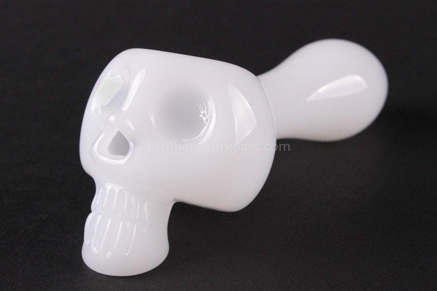 BWG-357W-2_1024x_759bdf2e-f5b5-4072-84d1-ef93e1477712.jpg Chameleon Glass Bone Head Skull Hand Pipe - Jade White - Image 1