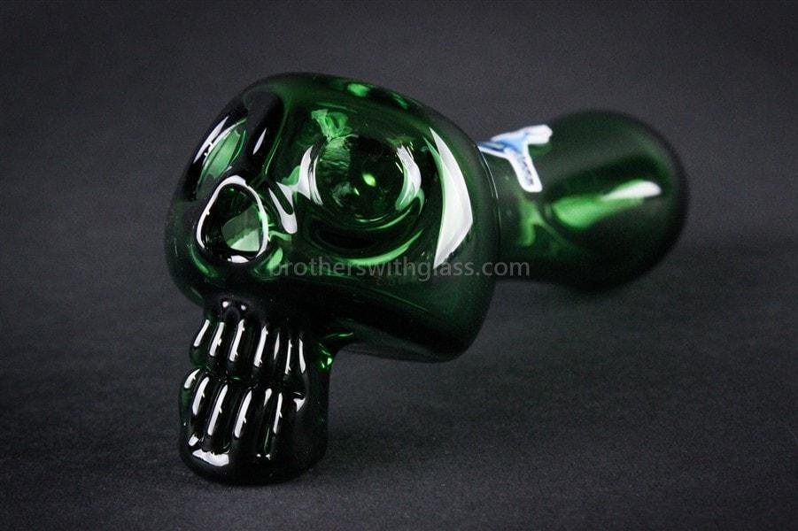 BWG-CG357G-2_1024x_3ef28b4a-ab80-48c9-90e4-80c8472d7802.jpg Chameleon Glass Bone Head Skull Hand Pipe - Steamrollers Pipe - Image 1